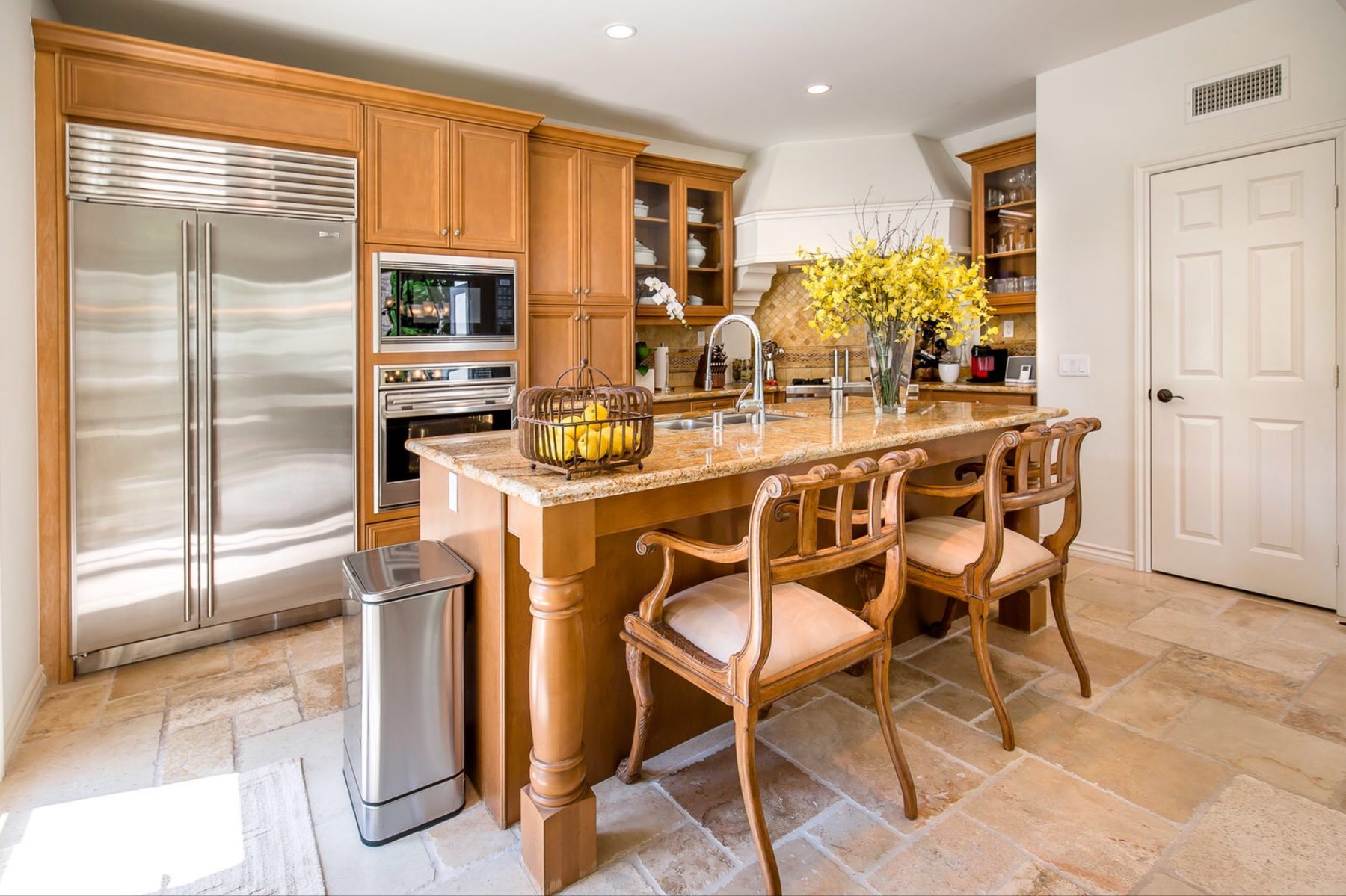Kitchen with Sub-Zero refrigeration and island